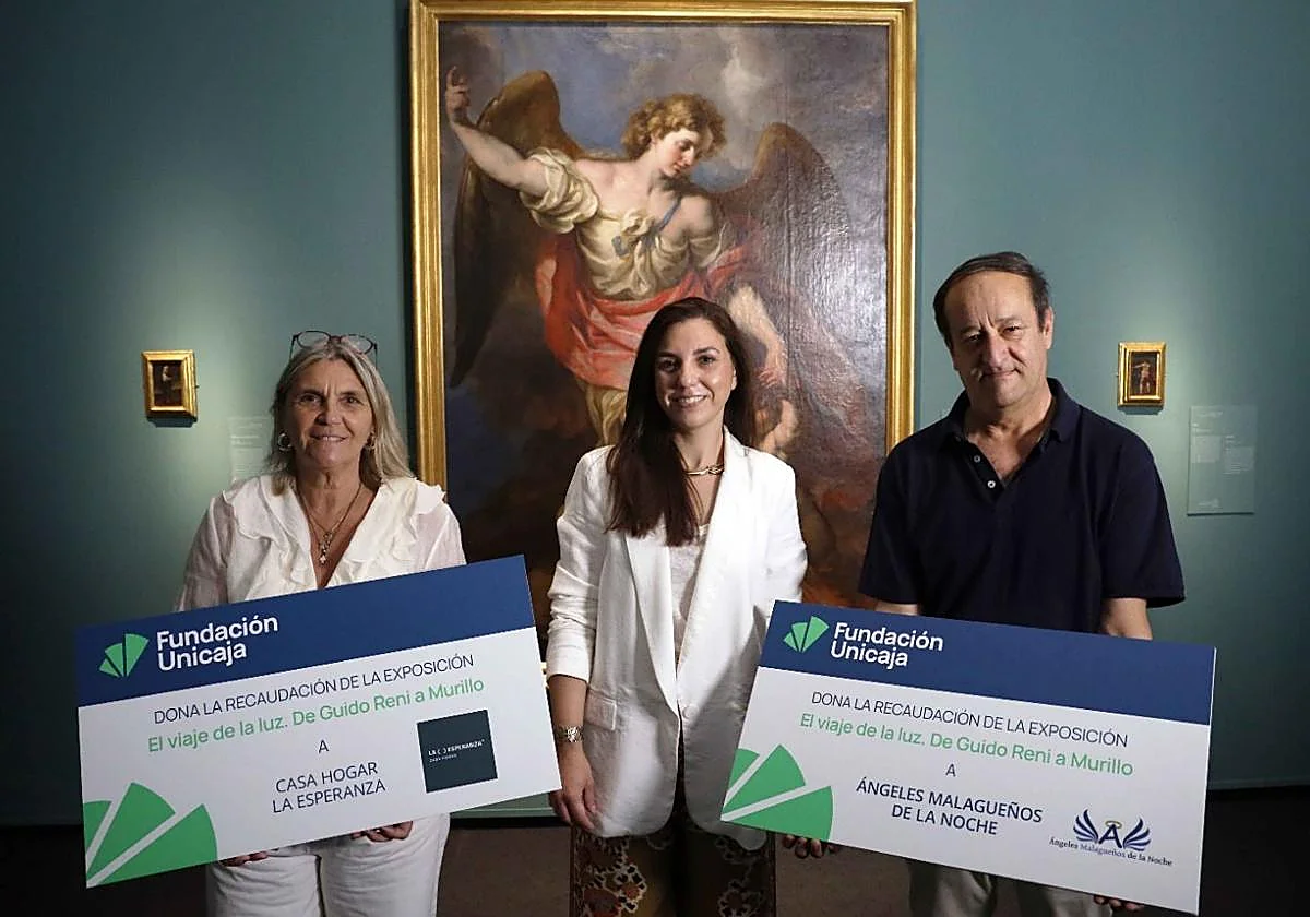 Los Ángeles Malagueños de la Noche y la Casa de la Esperanza reciben 43.000 euros recaudados en la exposición 'El viaje de la luz'