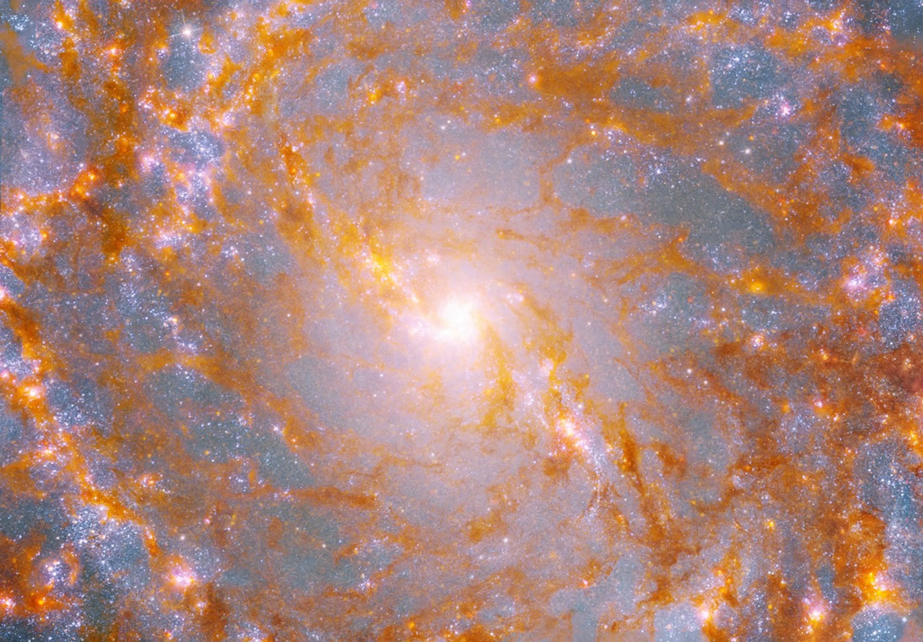 NASA’s Hubble, Webb Telescopes Survey Pinwheel Galaxy