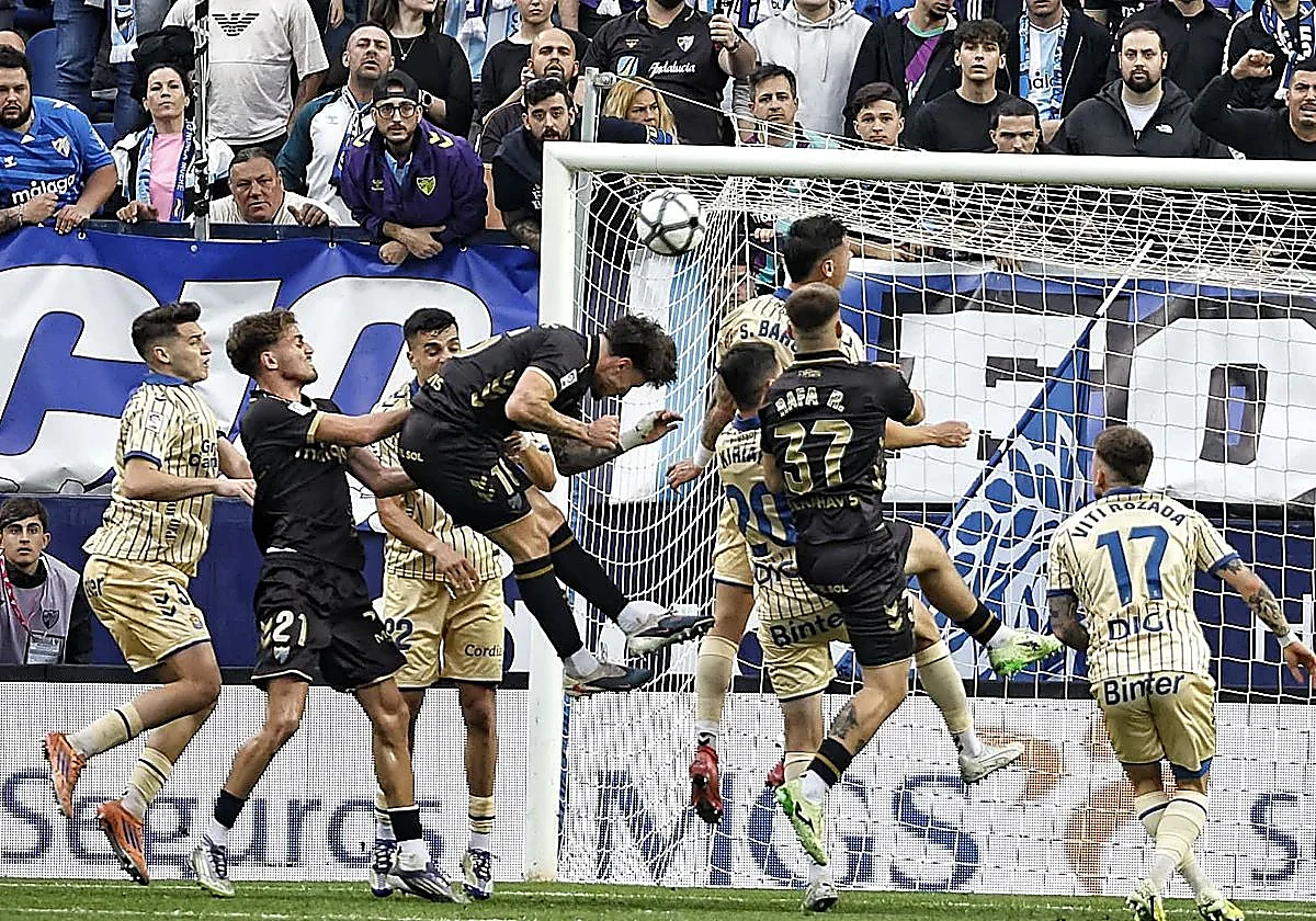 Two stunning strikes help Malaga CF turn back time and see off promotion rivals